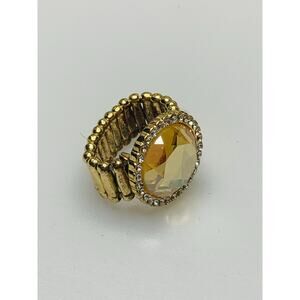 Gold Tone Stretchy Ring with Large Gold Stone Surrounded by Rhinestones